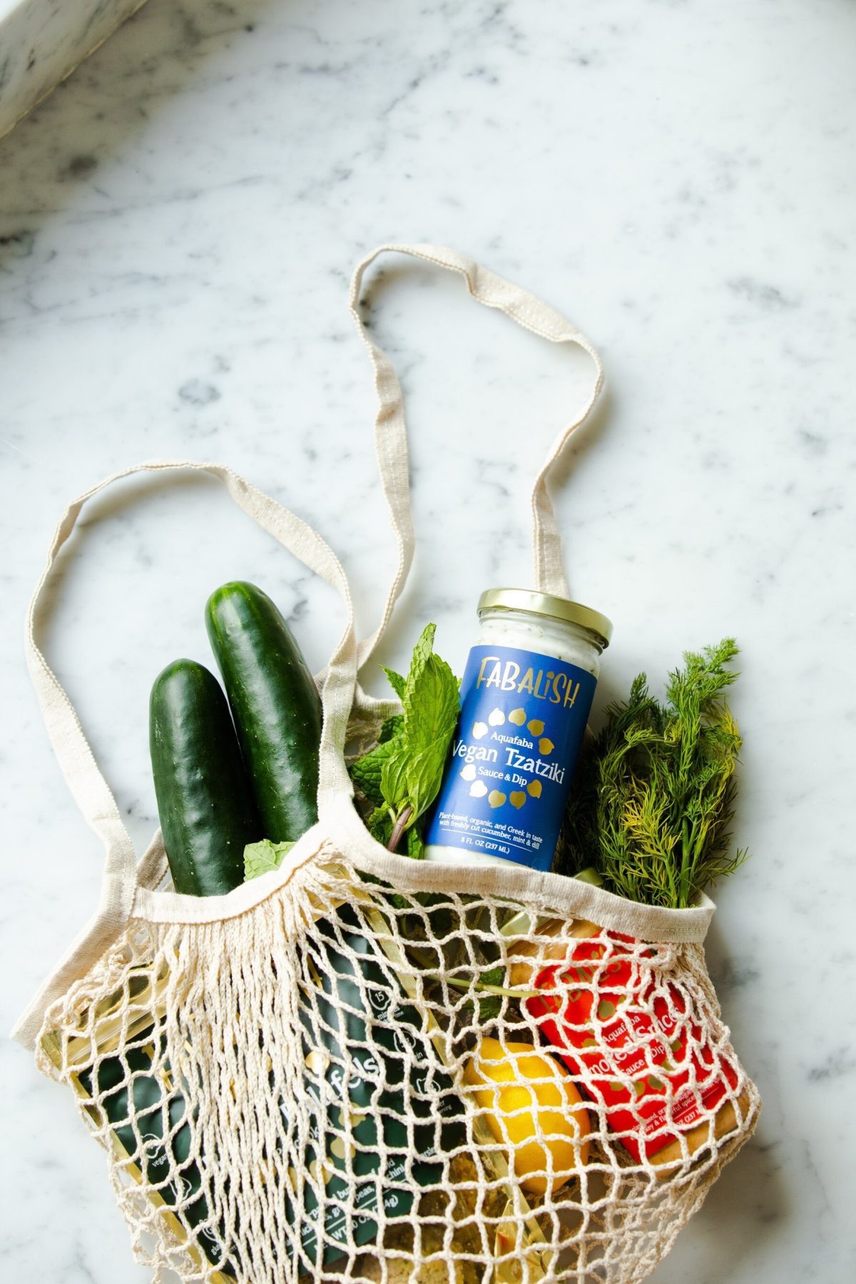Sustainability practices you can do at home (an image of veggies in a bag)