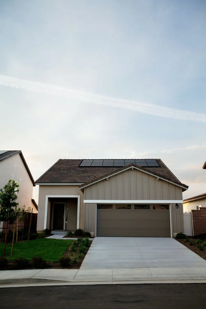 An image of a house with a solar panel