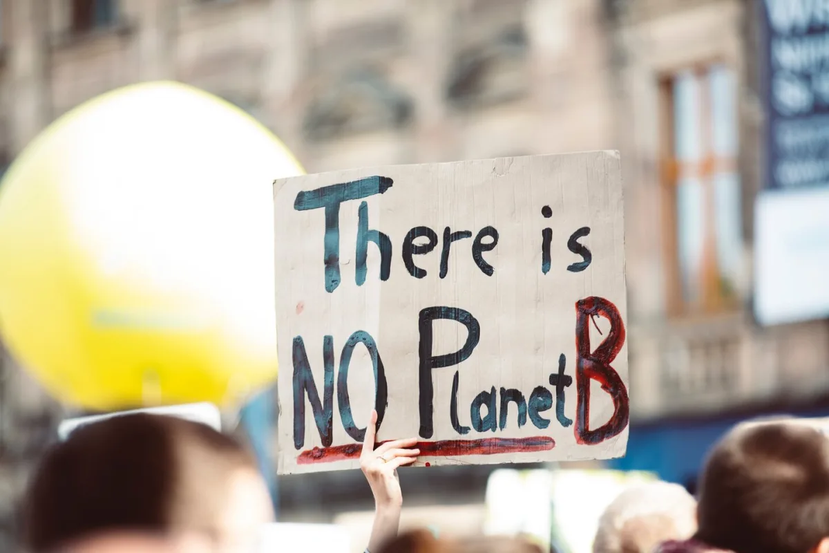 An image of a banner that says "There is no planet B"
